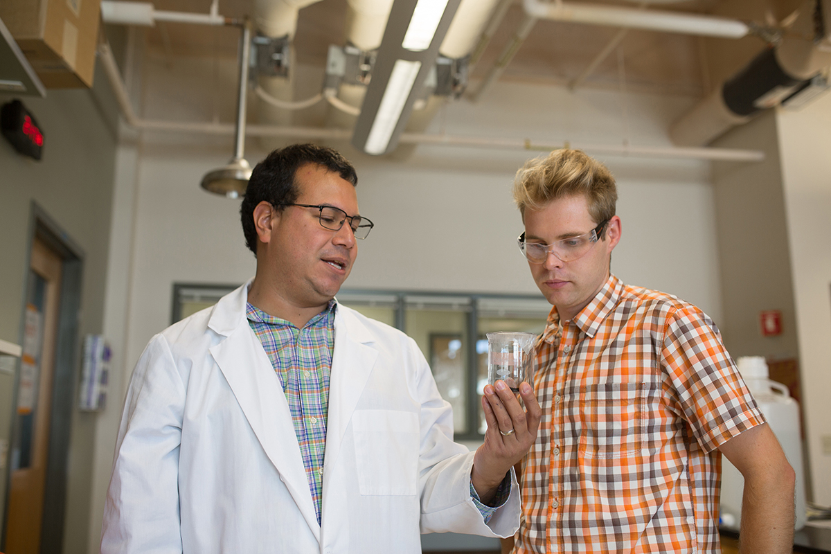 photo: Jose Cerrato with student in laboratory